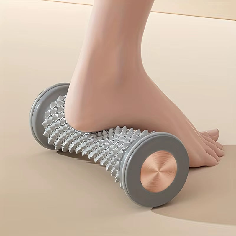 Grey textured foot roller used beneath the arch